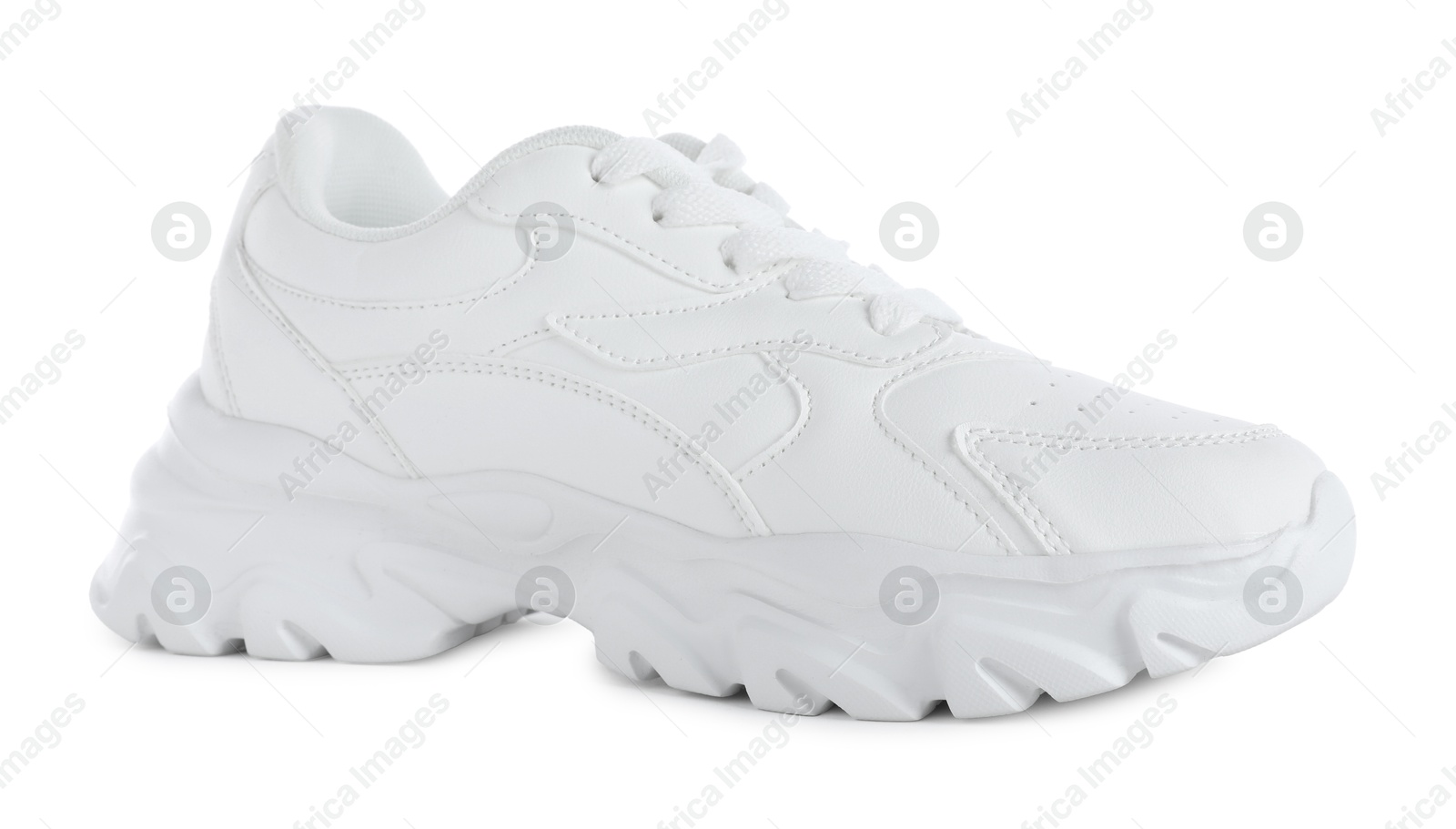 One stylish sneaker isolated on white. Sportive shoes Photo of One stylish sneaker isolated on white. Sportive shoes