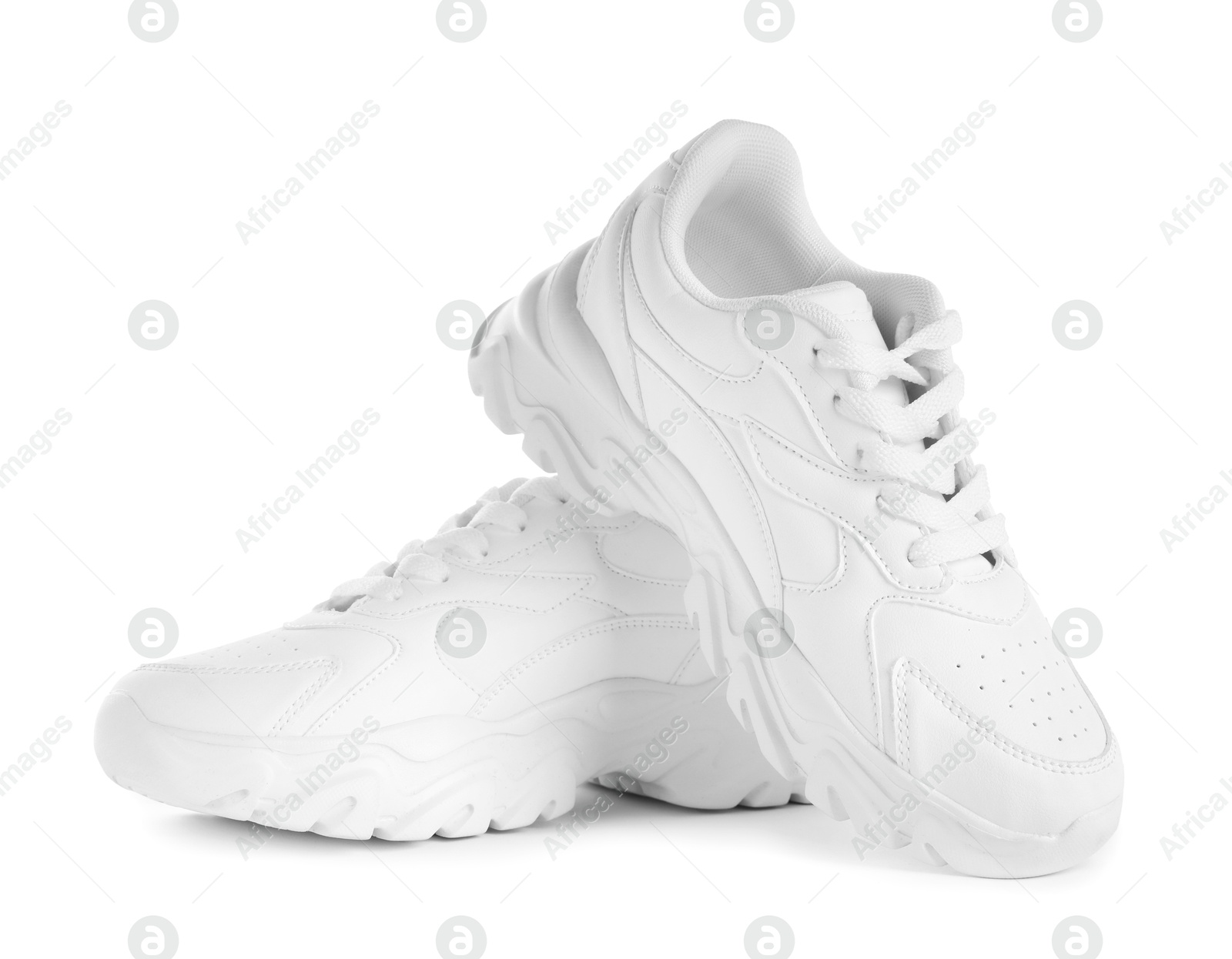 Pair of stylish sneakers isolated on white. Sportive shoes Photo of Pair of stylish sneakers isolated on white. Sportive shoes