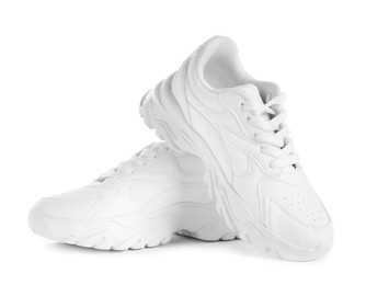 Photo of Pair of stylish sneakers isolated on white. Sportive shoes