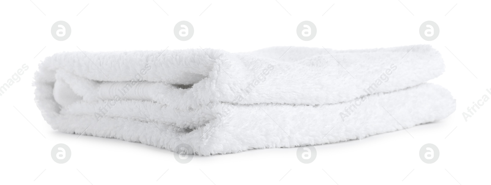 One folded terry towel isolated on white Photo of One folded terry towel isolated on white