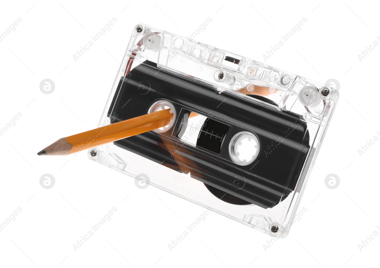 Rewinding audio cassette with pencil isolated on white Photo of Rewinding audio cassette with pencil isolated on white