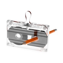 Photo of Rewinding audio cassette with pencil isolated on white