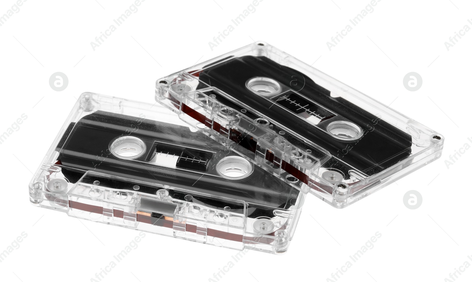 Audio cassettes with magnetic tapes isolated on white Photo of Audio cassettes with magnetic tapes isolated on white