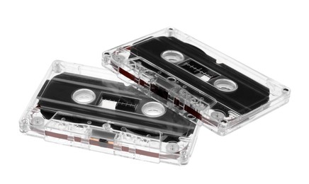 Photo of Audio cassettes with magnetic tapes isolated on white