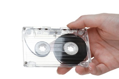Photo of Woman with audio cassette on white background, closeup