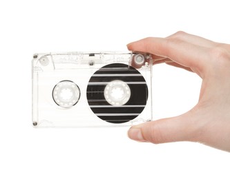 Photo of Woman with audio cassette on white background, closeup