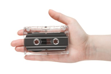Photo of Woman with audio cassette on white background, closeup