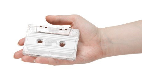 Photo of Woman with audio cassette on white background, closeup
