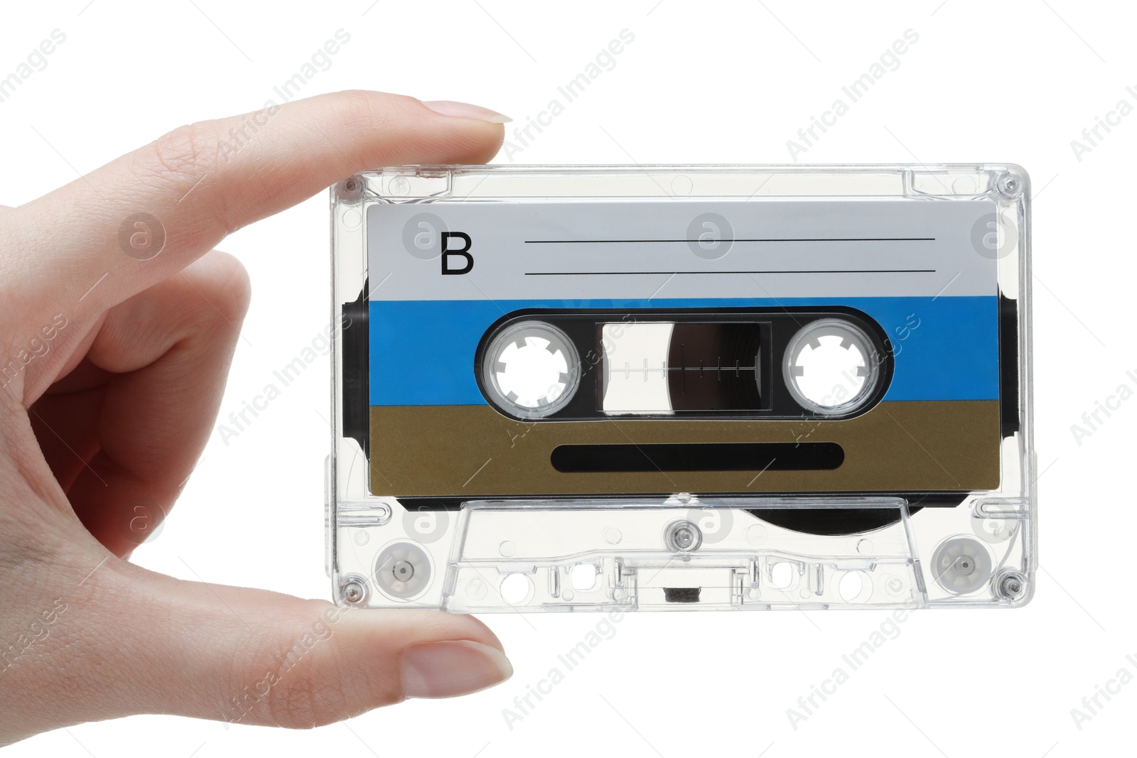 Woman holding audio cassette with blank label on white background, closeup Photo of Woman holding audio cassette with blank label on white background, closeup