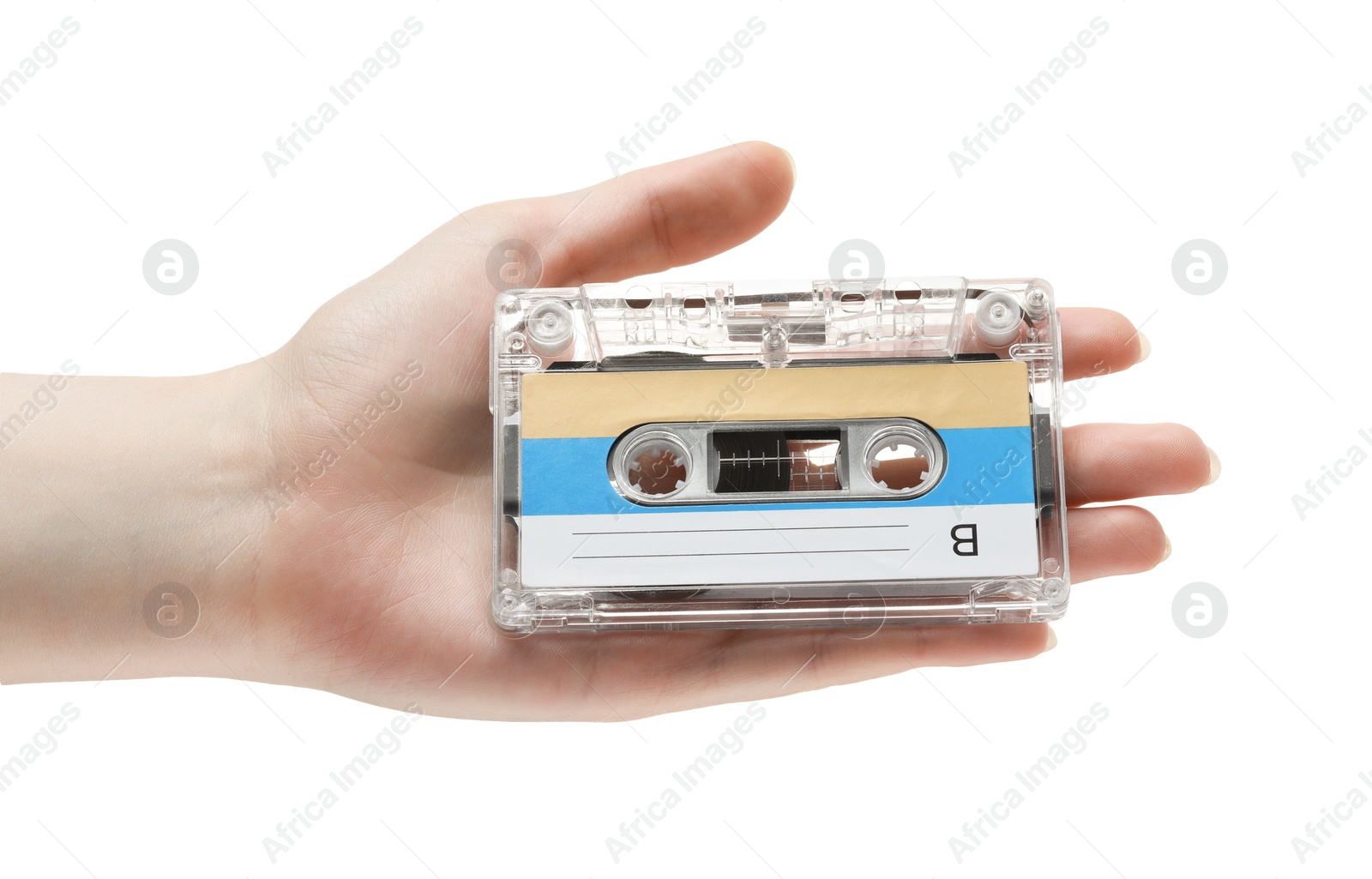 Woman holding audio cassette with blank label on white background, closeup Photo of Woman holding audio cassette with blank label on white background, closeup