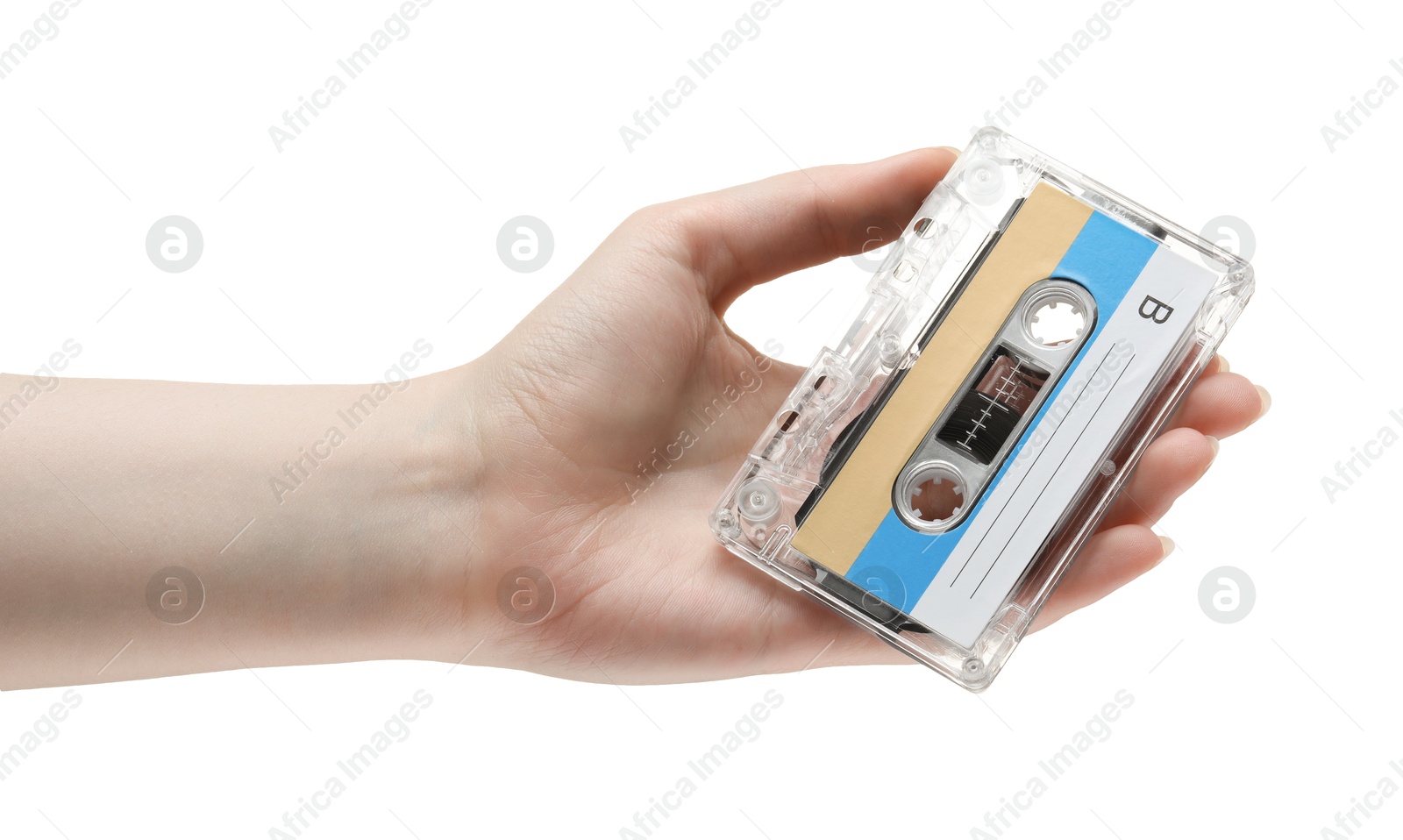Woman holding audio cassette with blank label on white background, closeup Photo of Woman holding audio cassette with blank label on white background, closeup