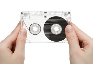 Photo of Woman with audio cassette on white background, closeup