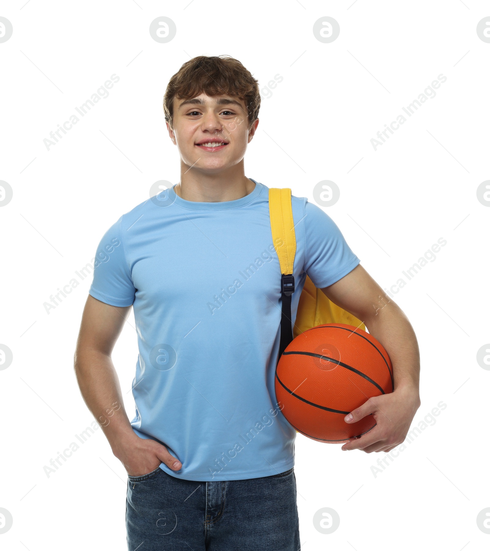Teenage boy with basketball on white background Photo of Teenage boy with basketball on white background