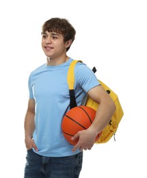 Photo of Teenage boy with basketball on white background