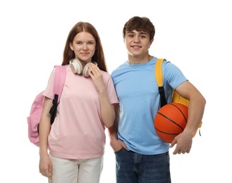 Photo of Teenage girl and boy with basketball on white background