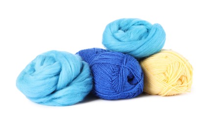 Photo of Felting wool and knitting yarns isolated on white