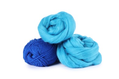 Photo of Felting wool and knitting yarn isolated on white