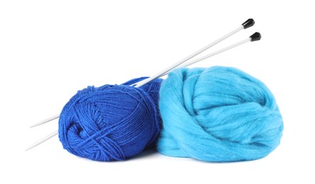 Photo of Felting wool, knitting yarn and needles isolated on white