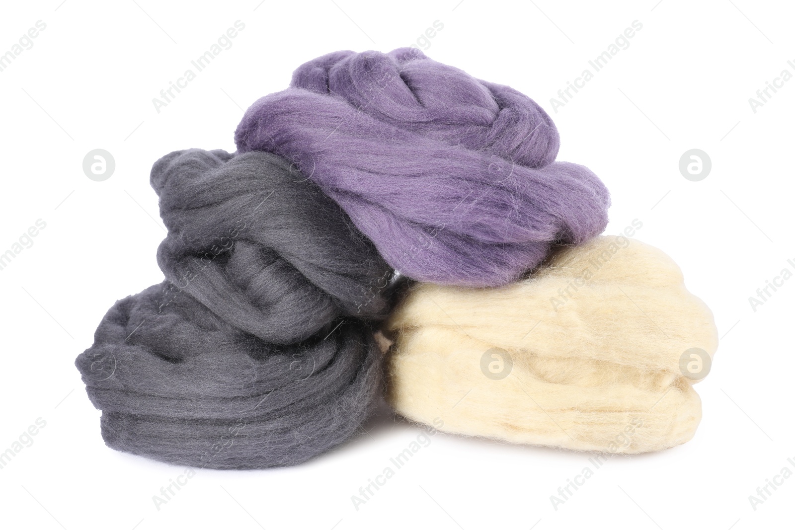 Different color felting wool isolated on white Photo of Different color felting wool isolated on white