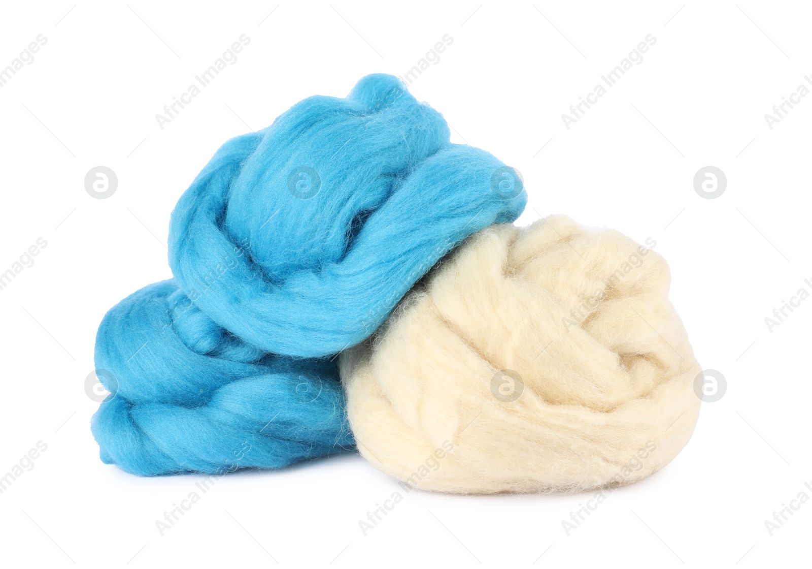 Different color felting wool isolated on white Photo of Different color felting wool isolated on white