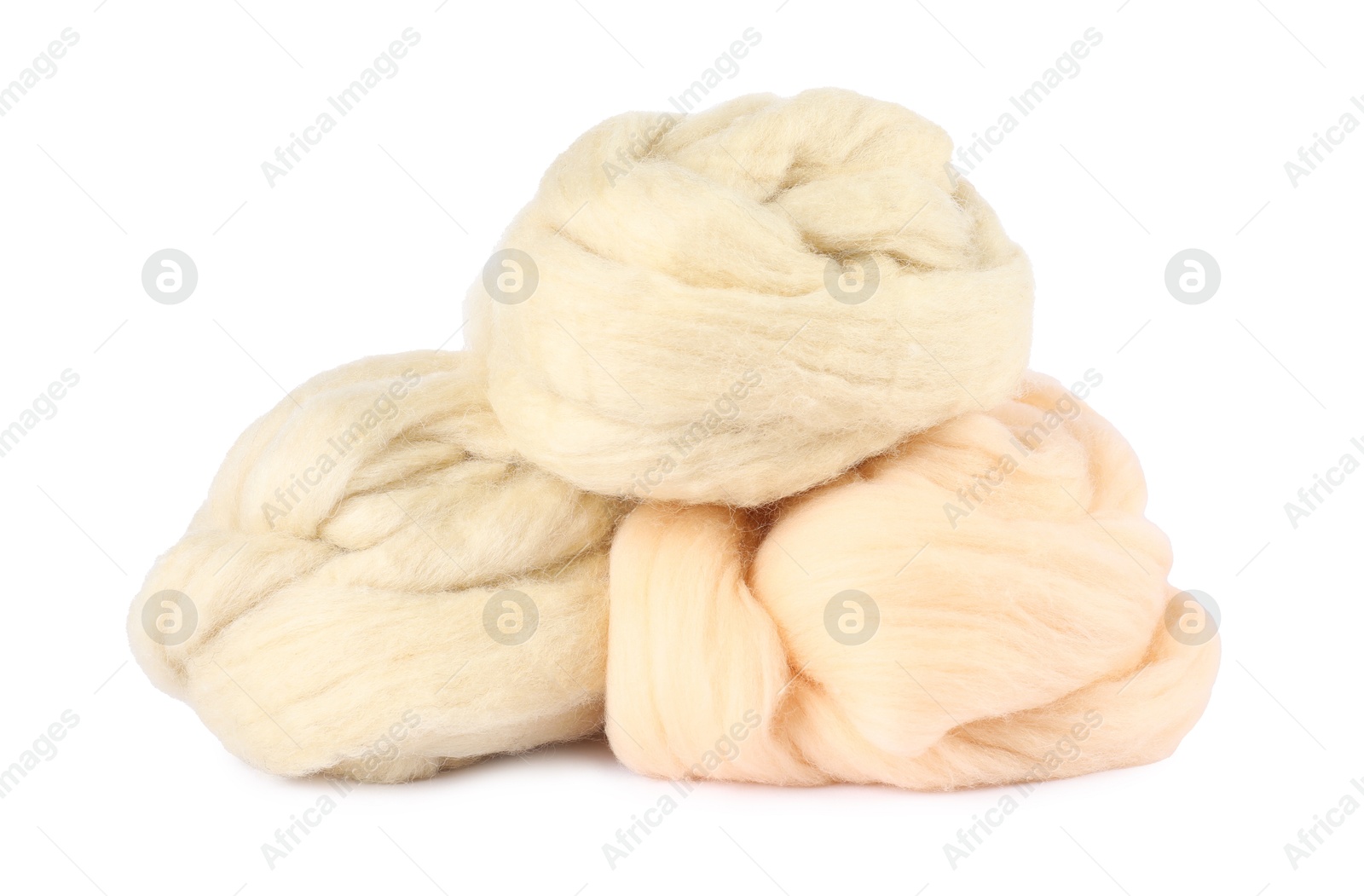 Soft wool for felting isolated on white Photo of Soft wool for felting isolated on white