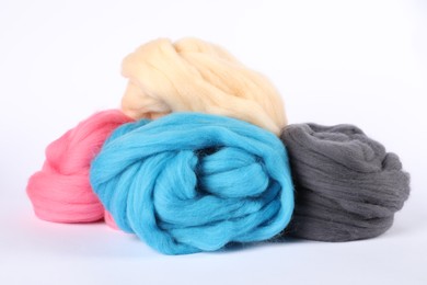 Photo of Different color felting wool isolated on white