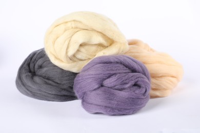 Photo of Different color felting wool isolated on white