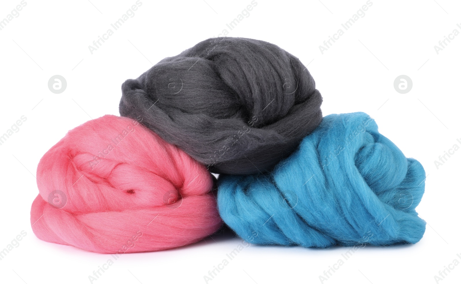 Different color felting wool isolated on white Photo of Different color felting wool isolated on white