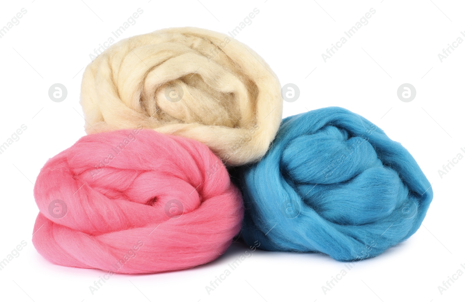 Different color felting wool isolated on white Photo of Different color felting wool isolated on white