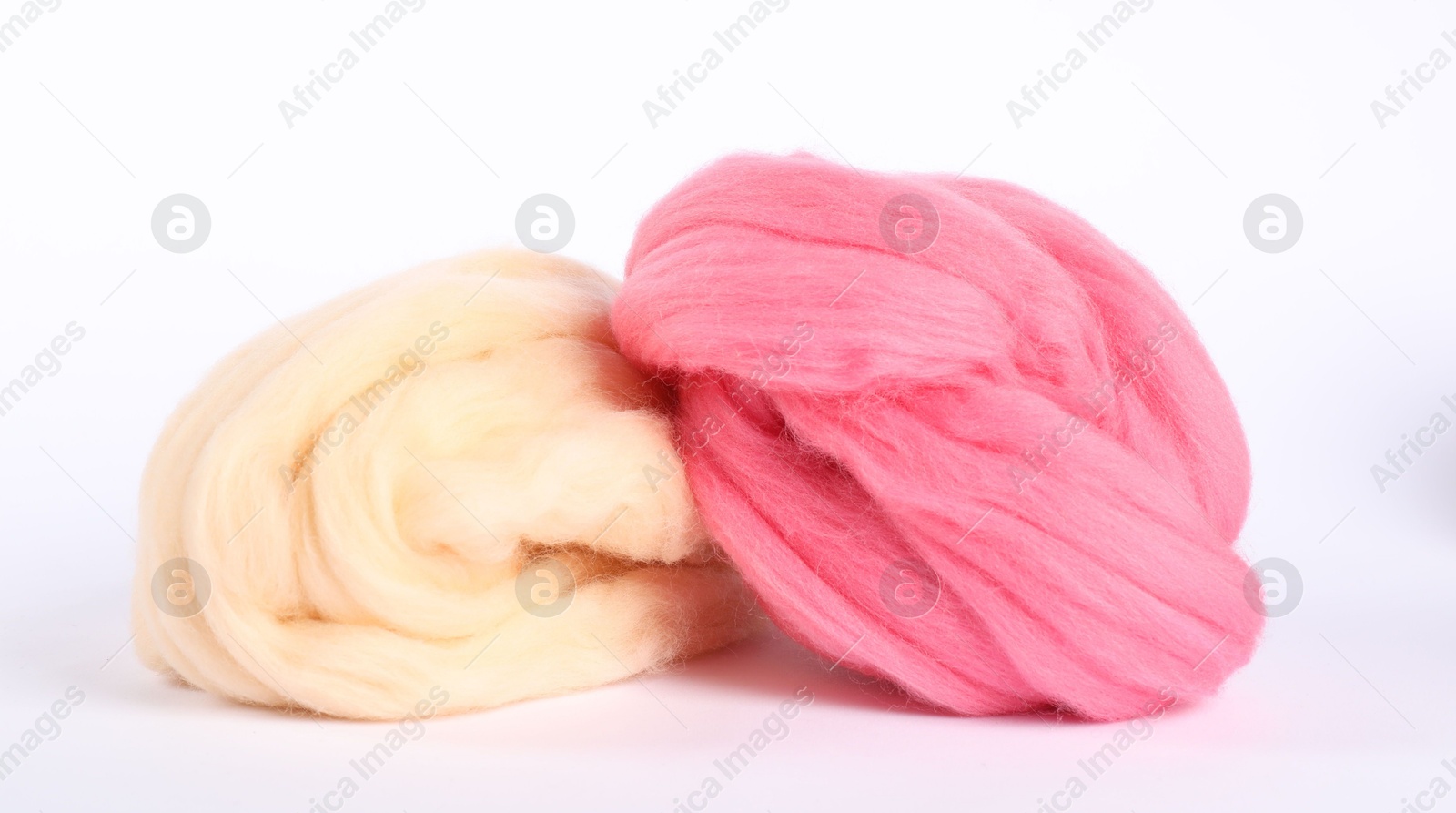 Different color felting wool isolated on white Photo of Different color felting wool isolated on white
