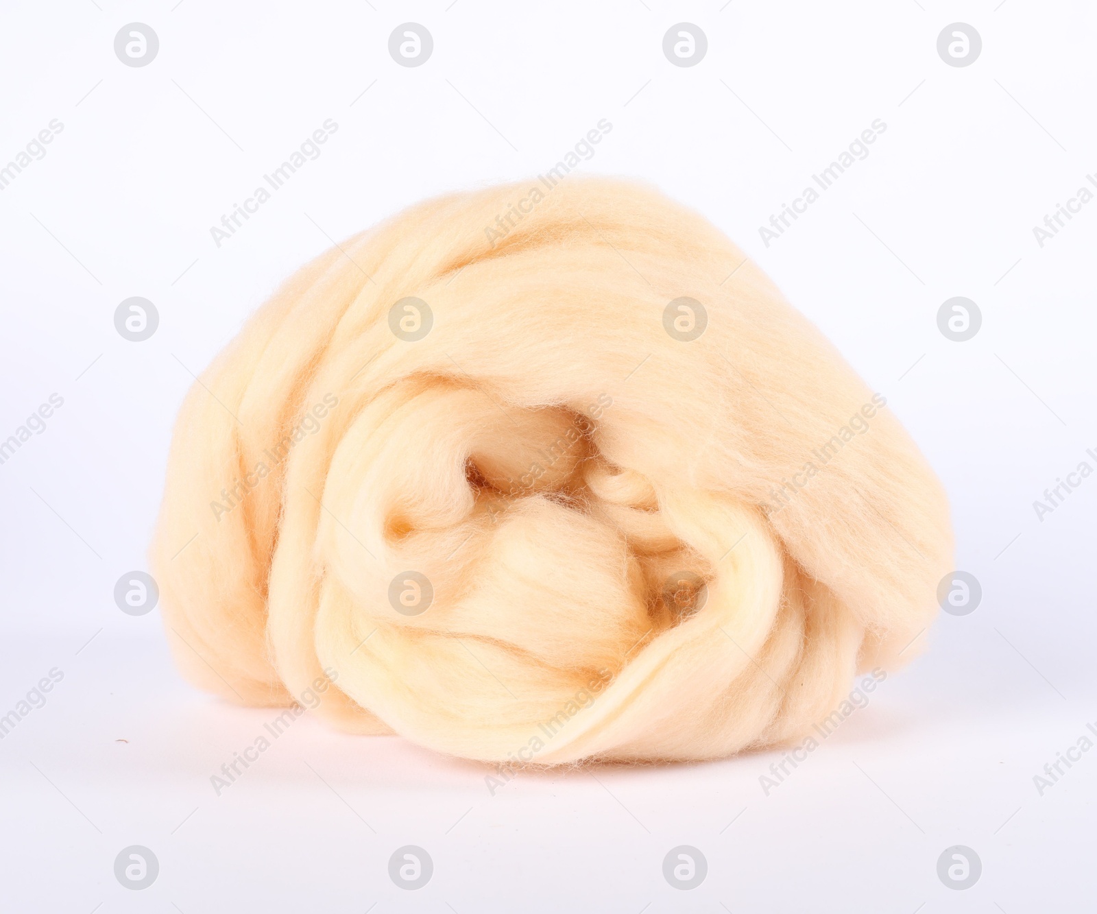 Soft wool for felting isolated on white Photo of Soft wool for felting isolated on white
