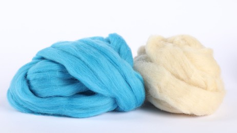 Photo of Different color felting wool isolated on white