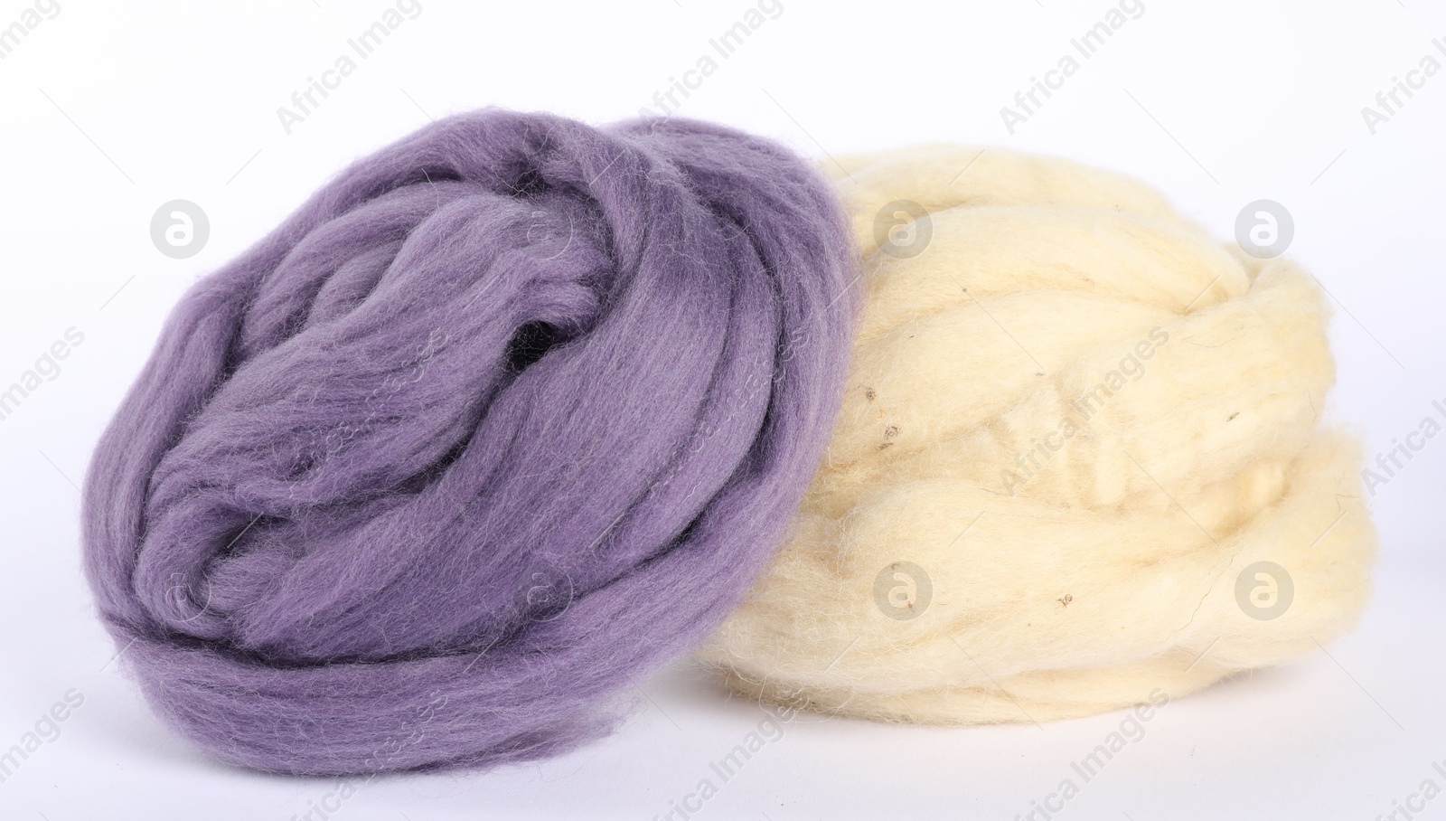 Different color felting wool isolated on white Photo of Different color felting wool isolated on white
