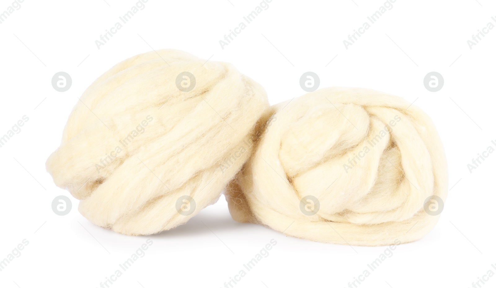 Soft wool for felting isolated on white Photo of Soft wool for felting isolated on white