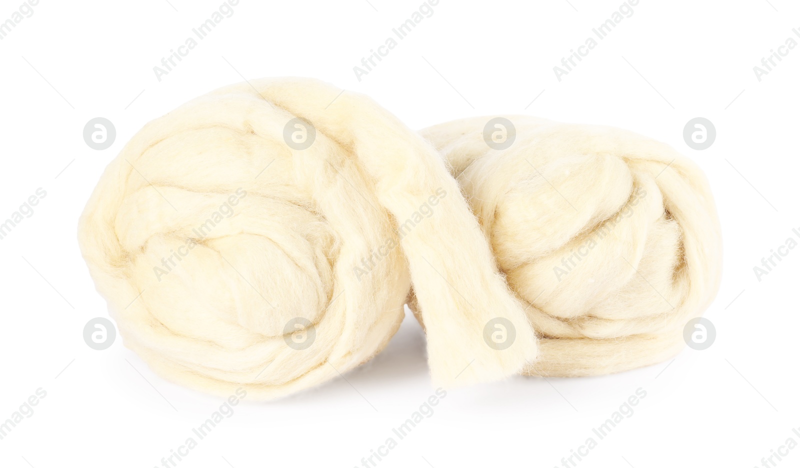Soft wool for felting isolated on white Photo of Soft wool for felting isolated on white