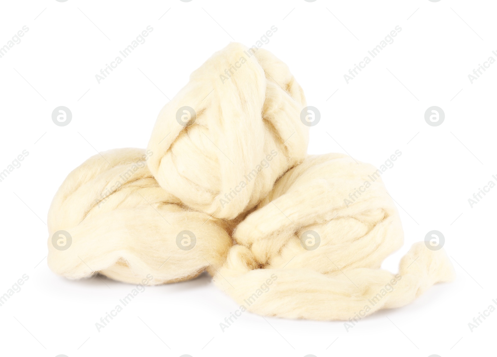 Soft wool for felting isolated on white Photo of Soft wool for felting isolated on white
