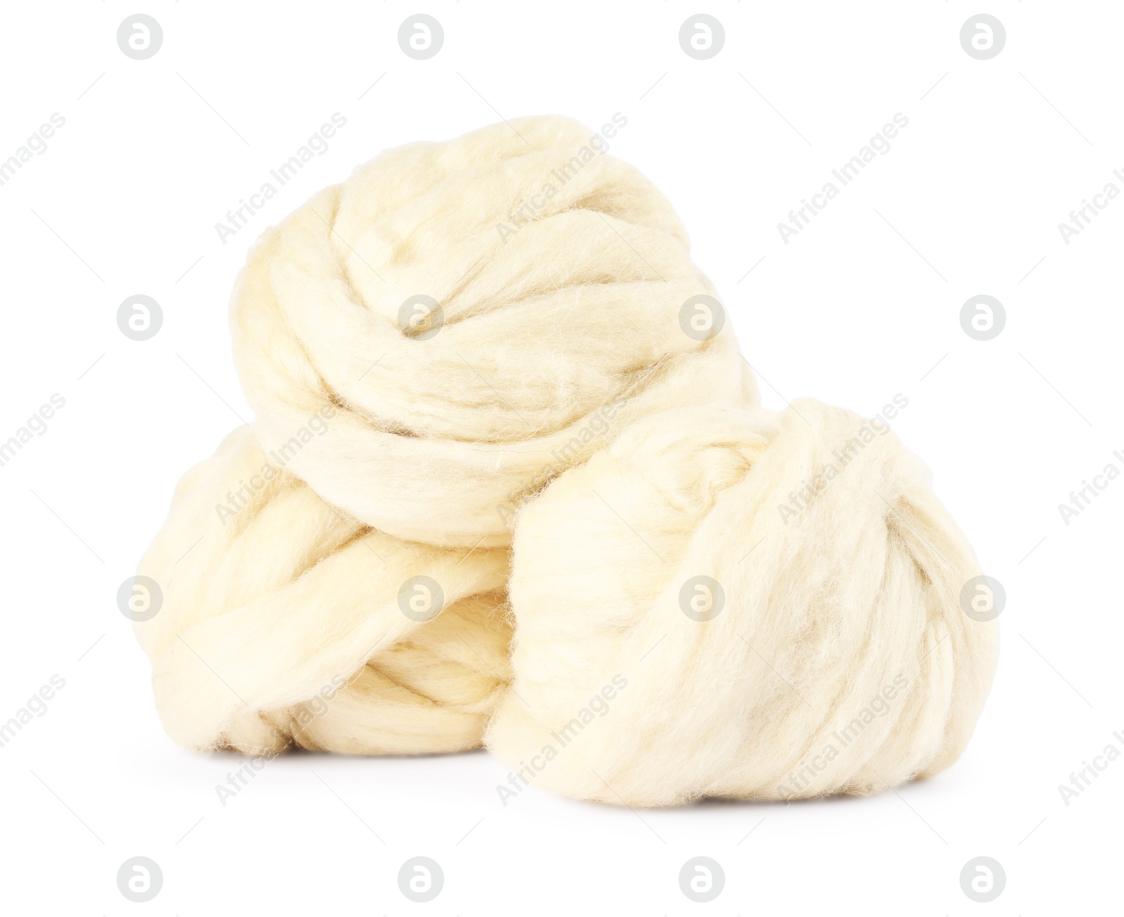 Soft wool for felting isolated on white Photo of Soft wool for felting isolated on white