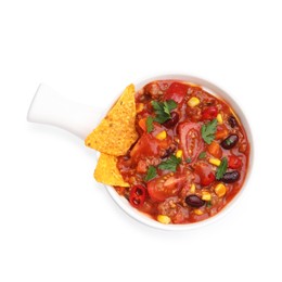 Photo of Tasty chili con carne in bowl and nachos isolated on white, top view