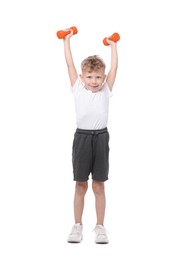 Photo of Little boy exercising with dumbbells on white background