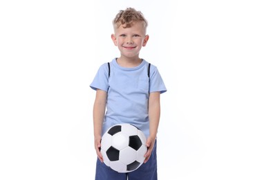 Photo of Little boy with soccer ball on white background