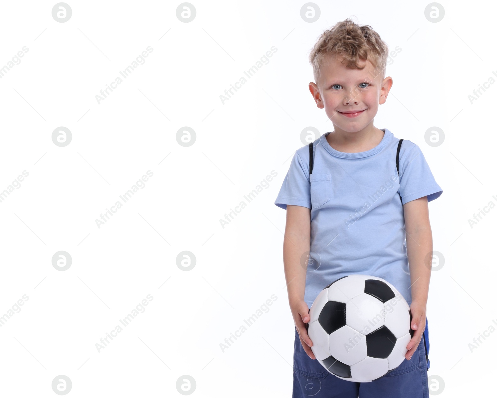 Little boy with soccer ball on white background, space for text Photo of Little boy with soccer ball on white background, space for text