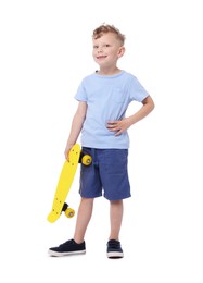 Photo of Little boy with penny board on white background