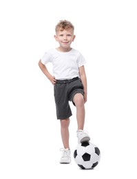 Photo of Little boy with soccer ball on white background