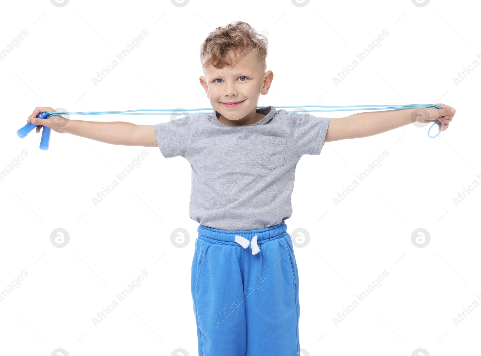 Little boy with jump rope on white background Photo of Little boy with jump rope on white background