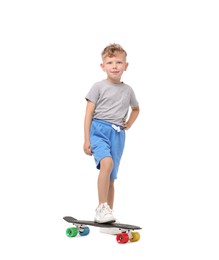 Photo of Little boy with penny board on white background