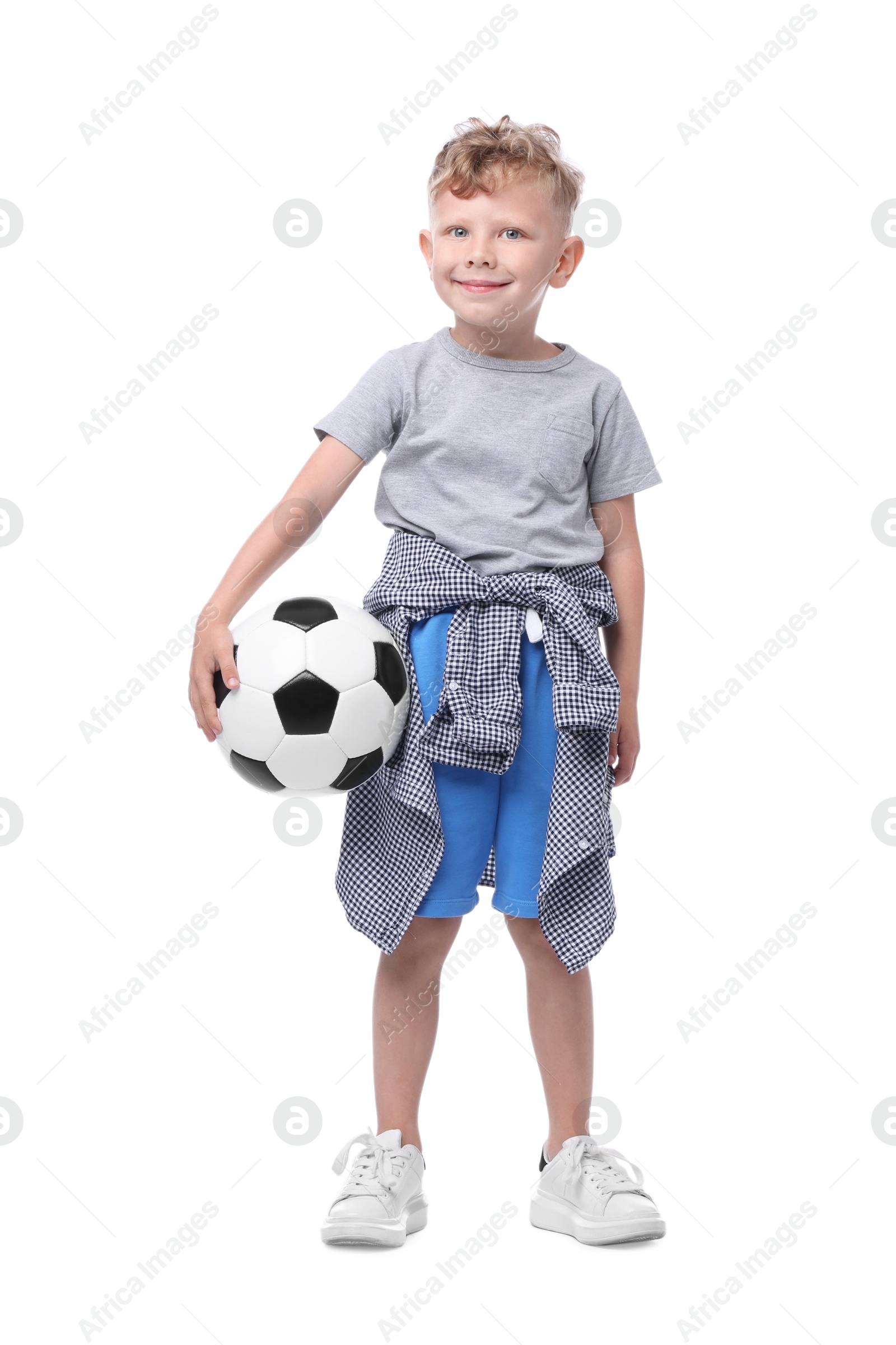 Little boy with soccer ball on white background Photo of Little boy with soccer ball on white background