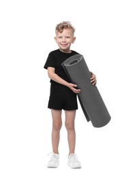 Photo of Little boy with yoga mat on white background
