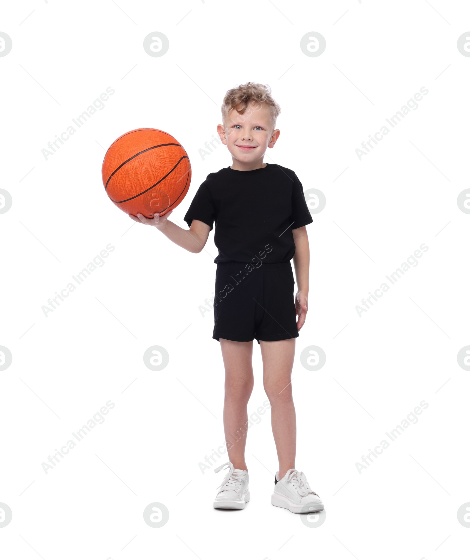 Little boy with basketball ball on white background Photo of Little boy with basketball ball on white background