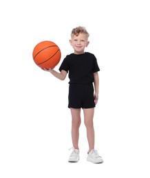 Photo of Little boy with basketball ball on white background