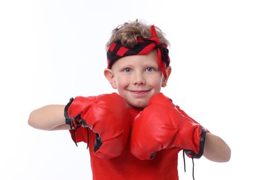 Photo of Little boy with boxing gloves on white background